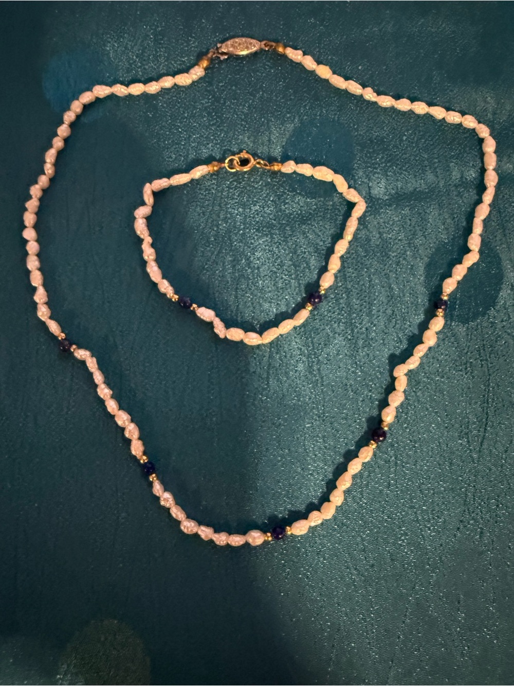 Necklace and bracelet set with gold beans and lapis beads